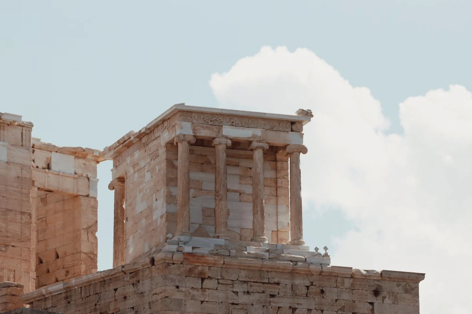The grand facade of the Academy of Athens, representing wisdom and structure.